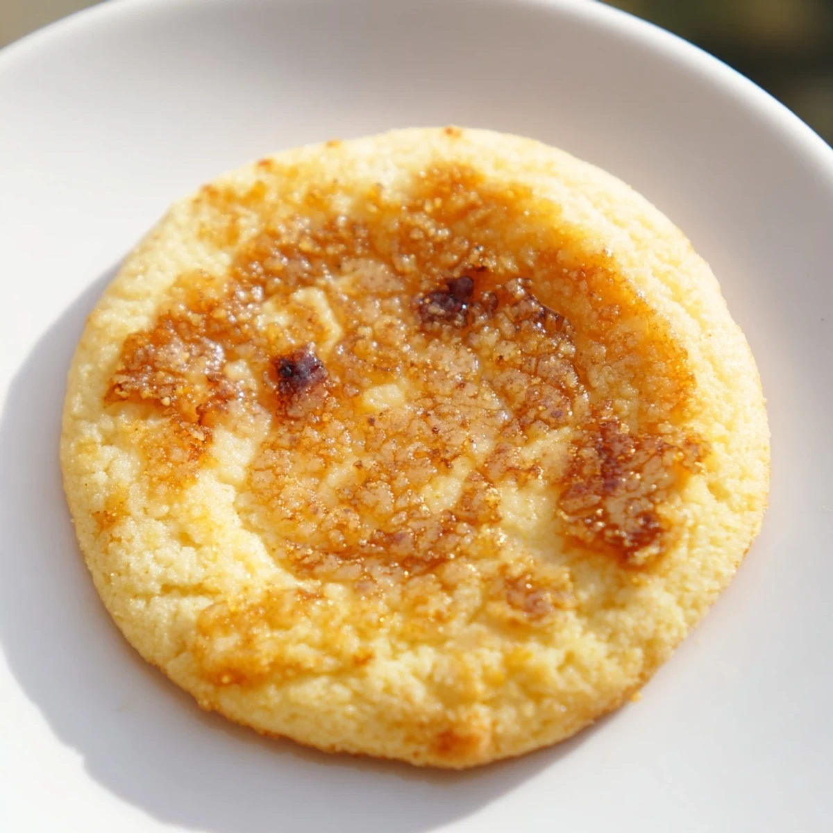 Soft baked creme brulee cookies with caramelized golden tops and creamy vanilla centers