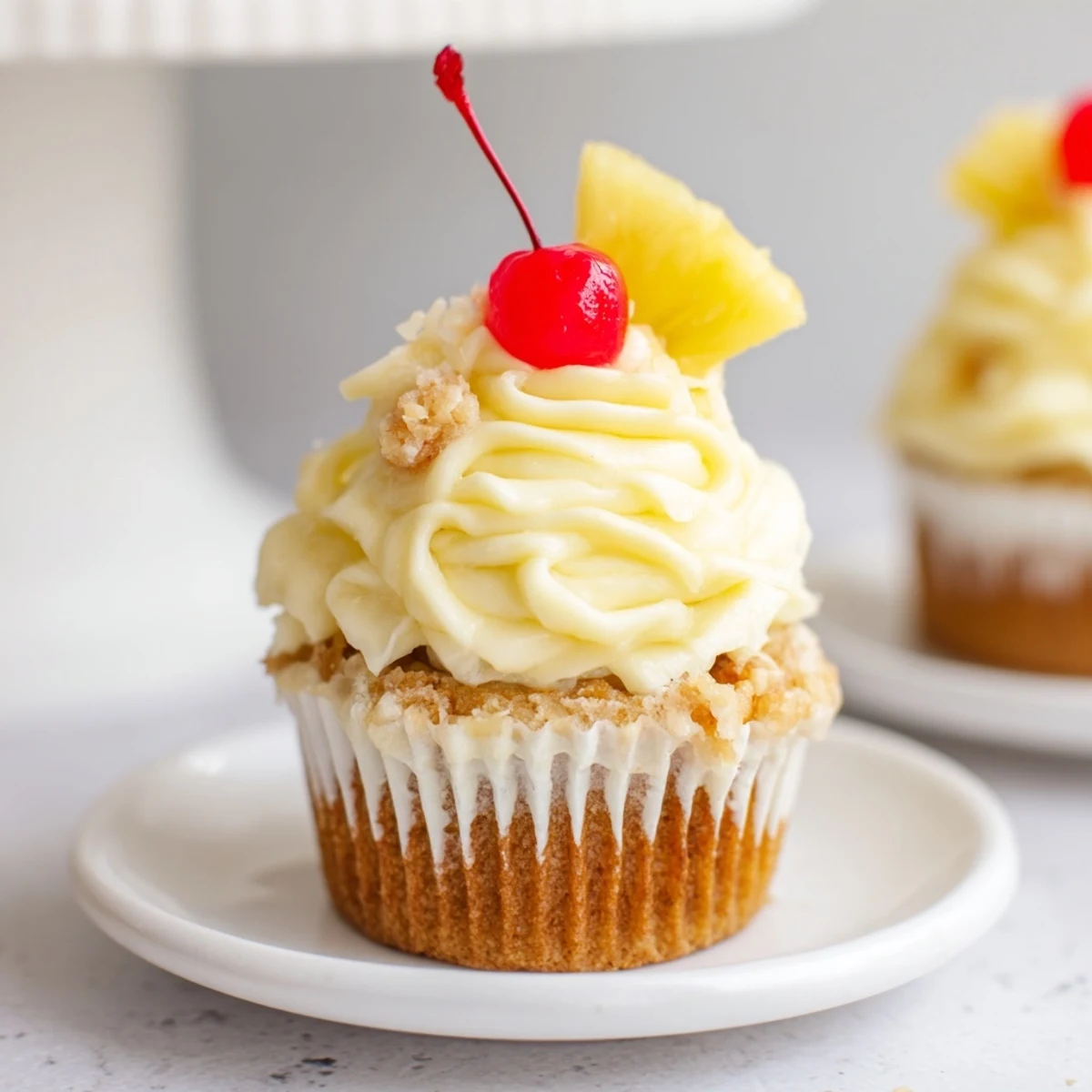 Airy, sweet Dole Whip Cupcakes Recipe cooling on rack, ready to pipe frosting