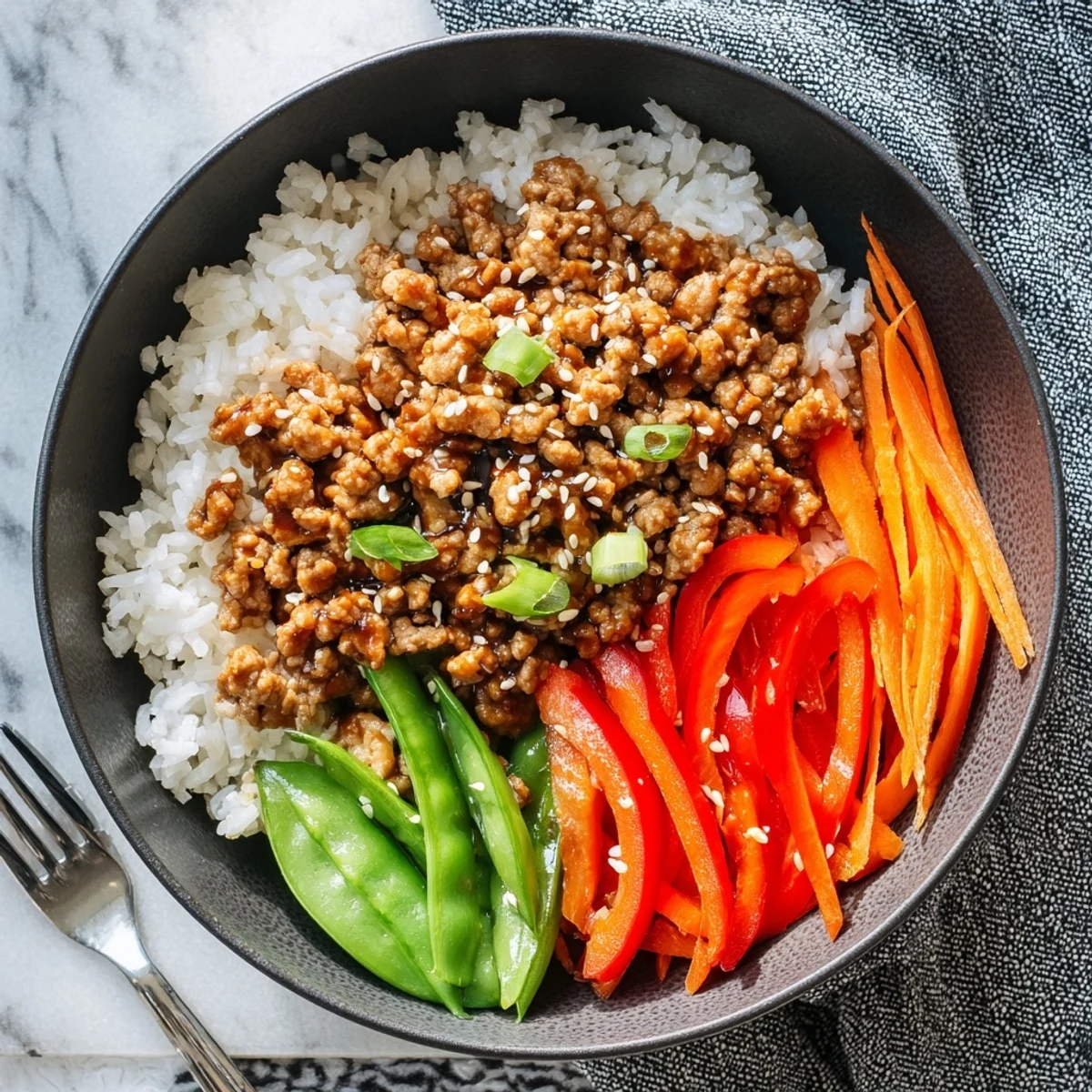 Teriyaki Turkey Rice Bowls with sticky teriyaki glaze, fluffy jasmine rice, scallions